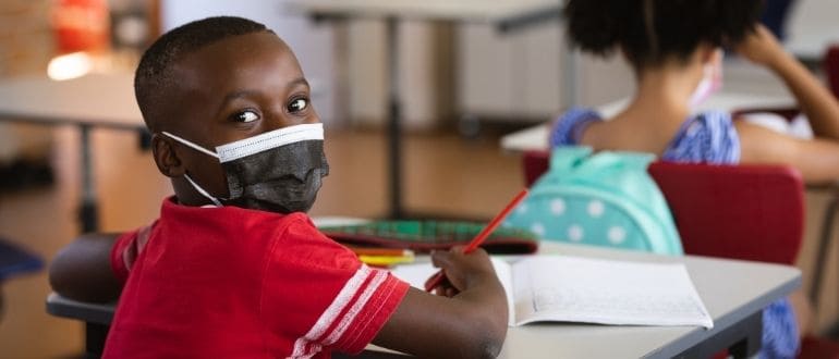 Masking and vaccinating: the fight to keep in-person learning safe